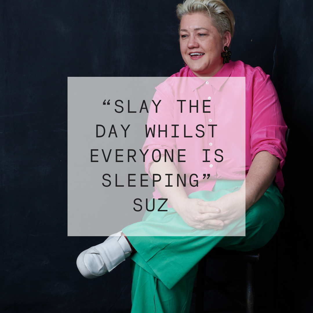Person sitting with a motivational quote overlay on a dark background