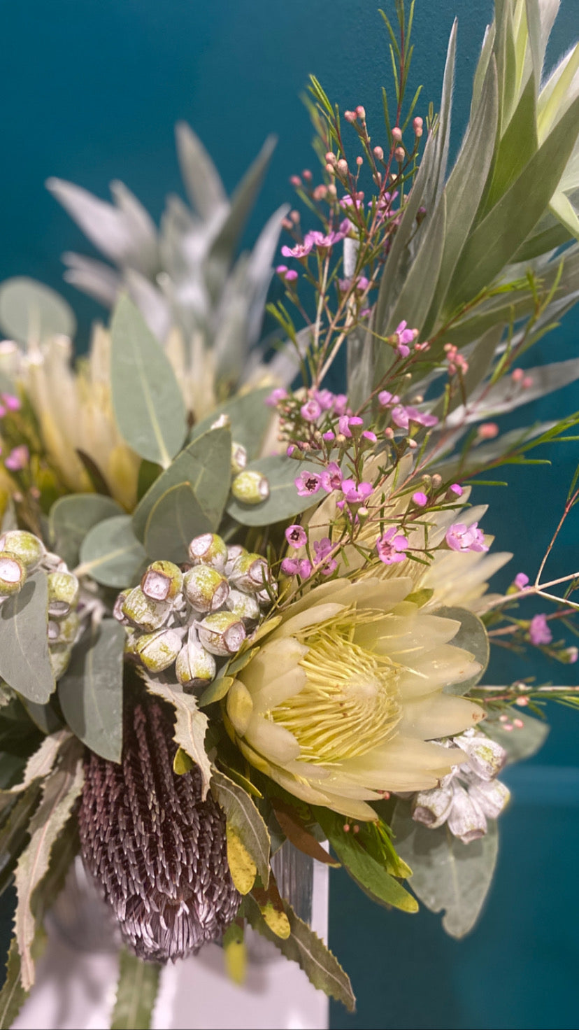 Silver, lemon yellow and plum colour Australian native native flower bouquet.