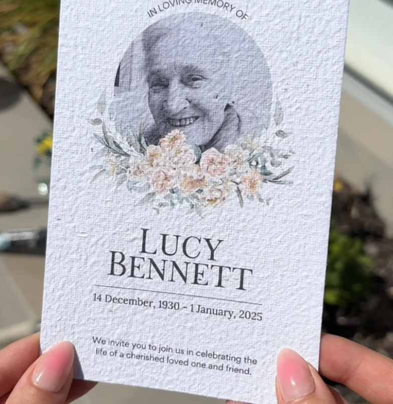 A memorial card of a passed beloved,with photo, date of passing on a textured white paper
