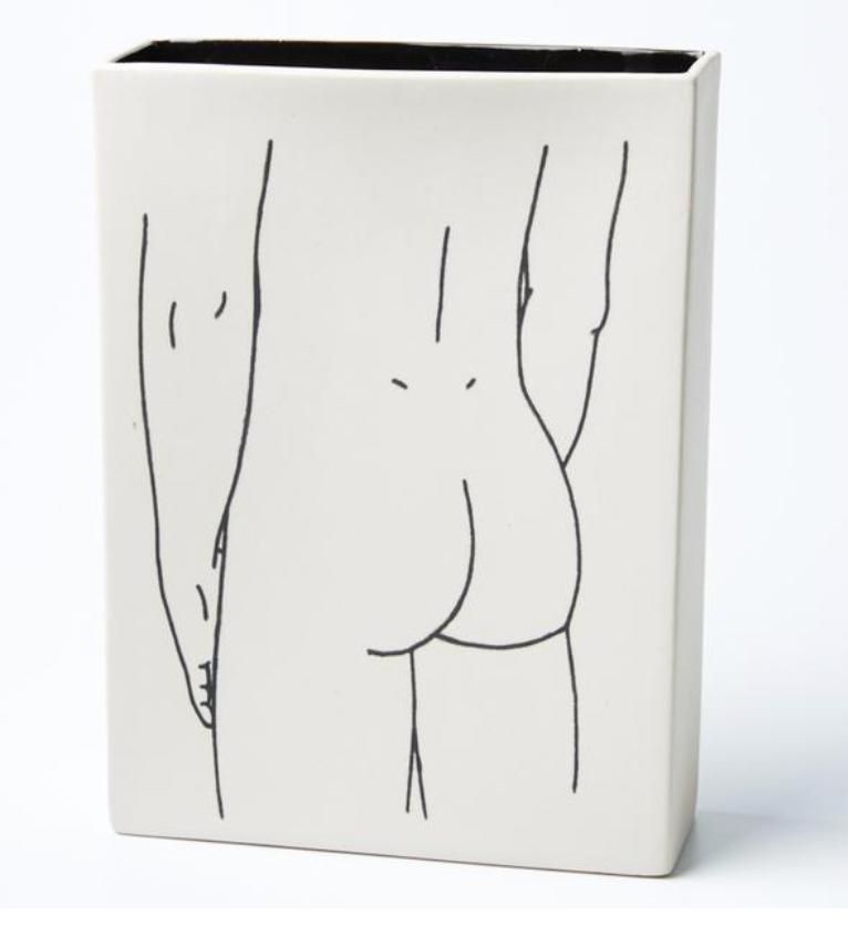 A tall, narrow, white rectangular vase with the illustration of a man's bottom