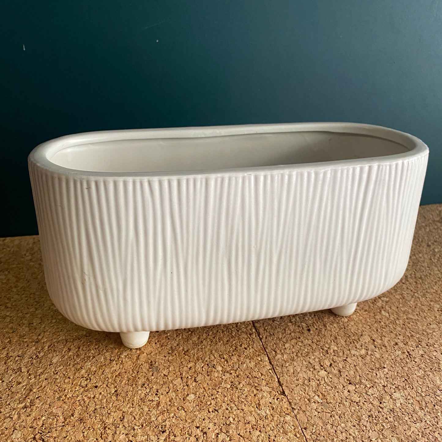 White textured low trough vase for plant of flower display