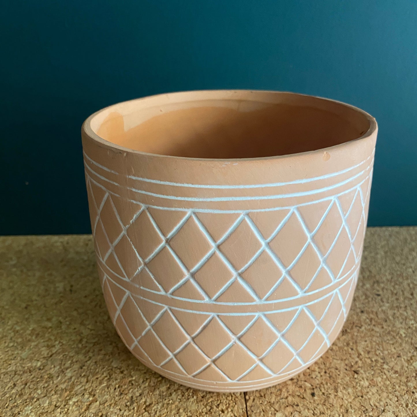 Terracotta and white wash vase/pot with a white grid pattern