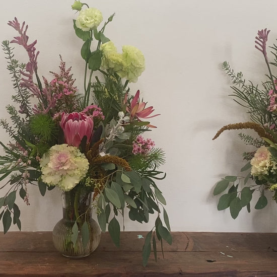 Standard sized vases for a Funeral in a mix of Aussie Natives and seasonal blooms
