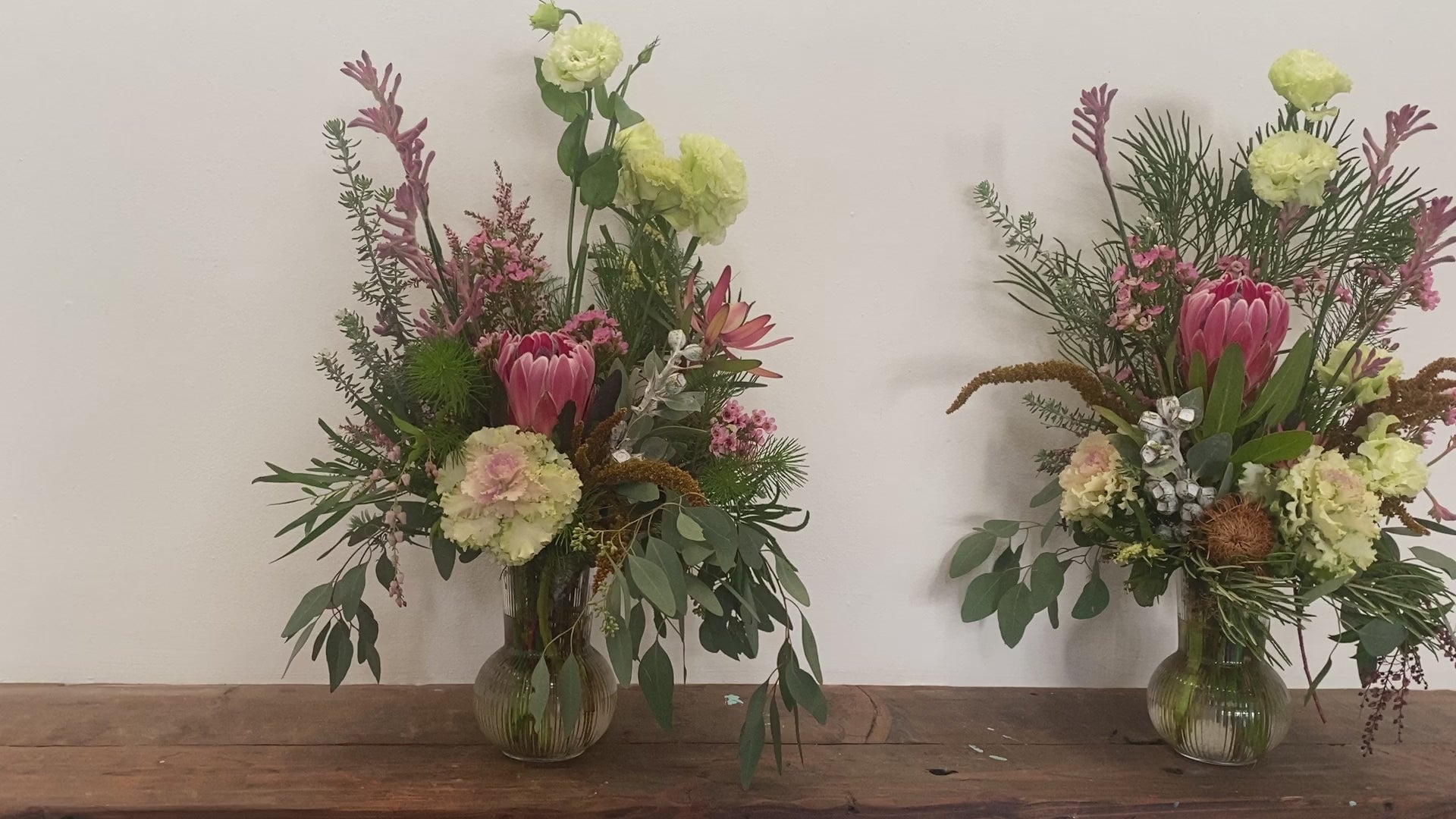 Standard sized vases for a Funeral in a mix of Aussie Natives and seasonal blooms